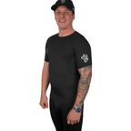 Men's compression shirt worn under dirt bike riding gear