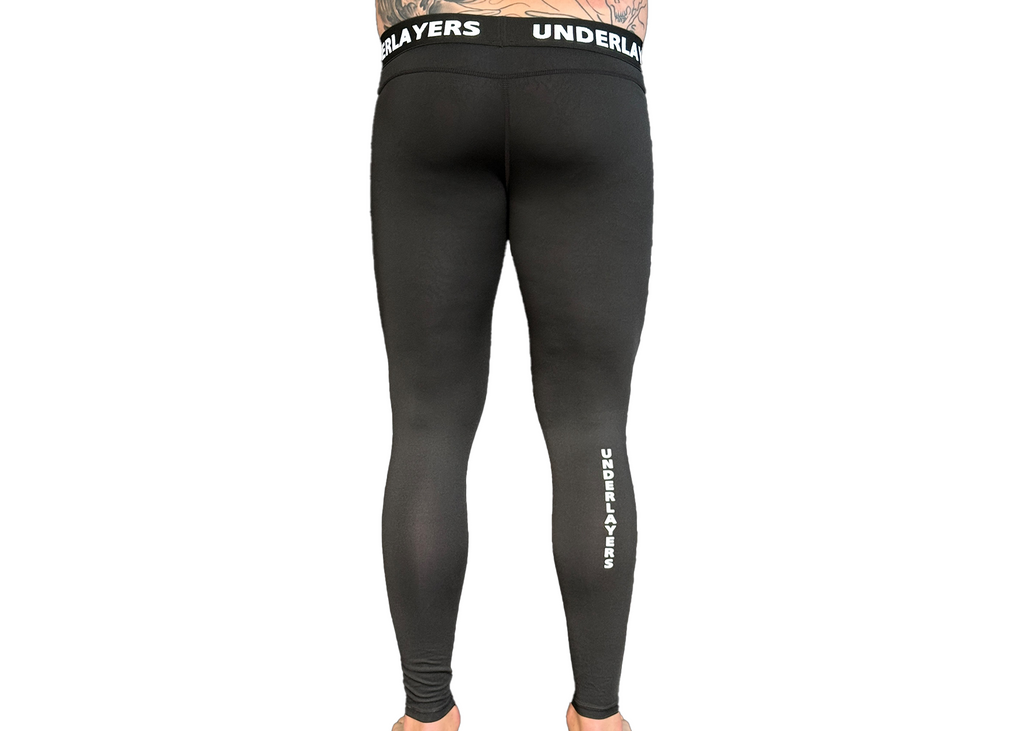 Man wearing UNDERLAYERS compression leggings during training