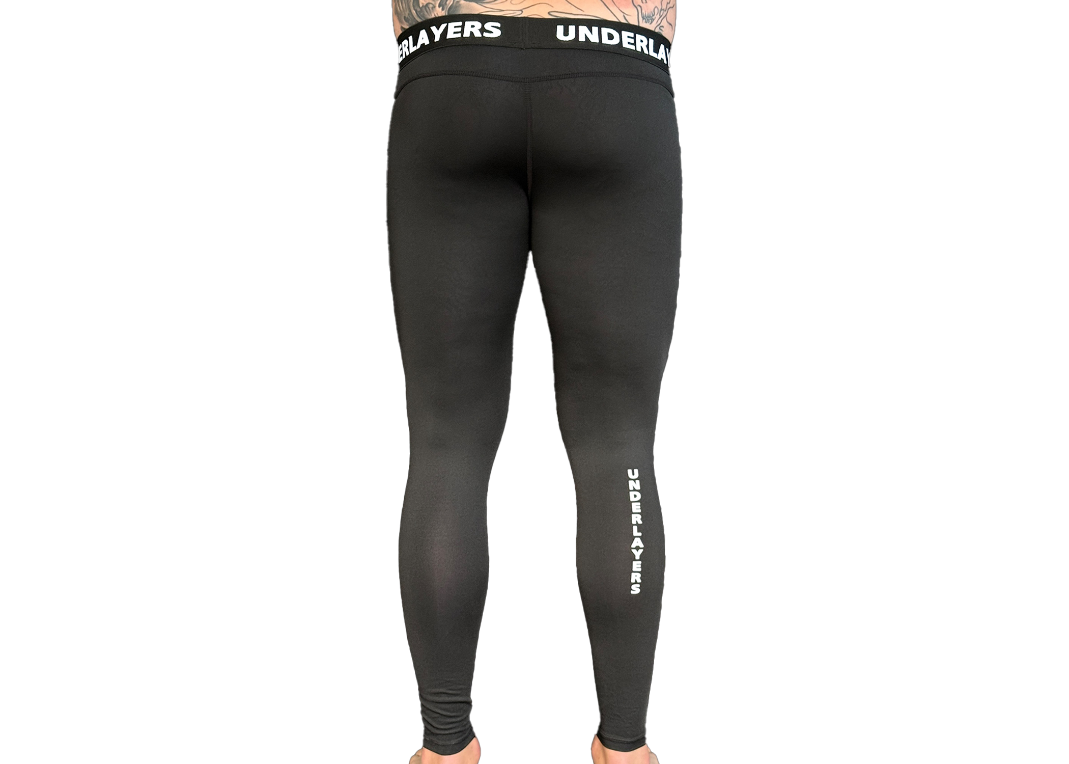 Man wearing UNDERLAYERS compression leggings during training