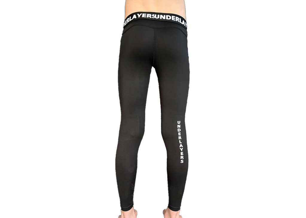 Young athlete wearing UNDERLAYERS youth compression leggings